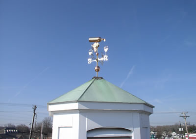 Copper Bottle Weathervane on Wine Store in Cincinnati OH